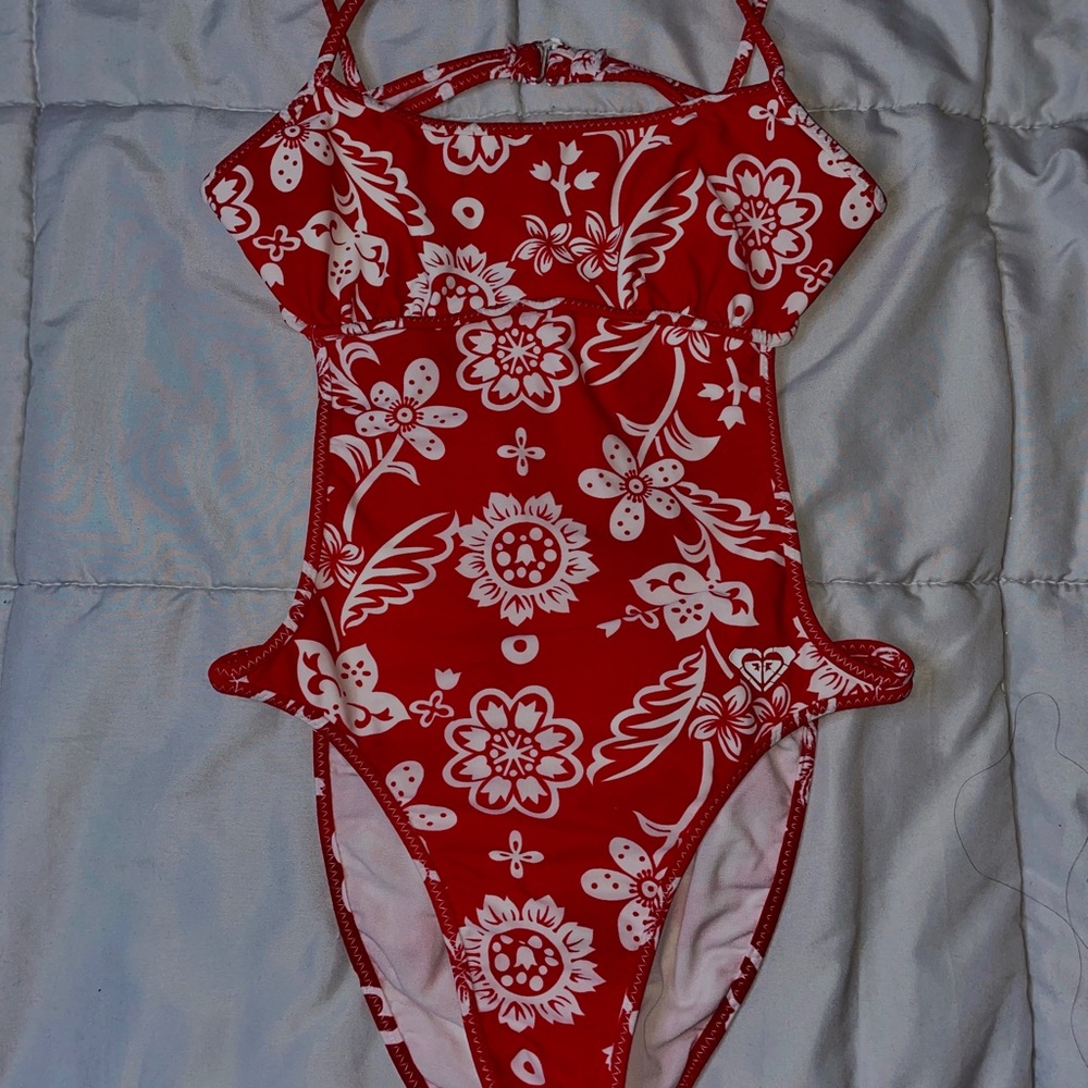 Red and white one piece bathing suit open back